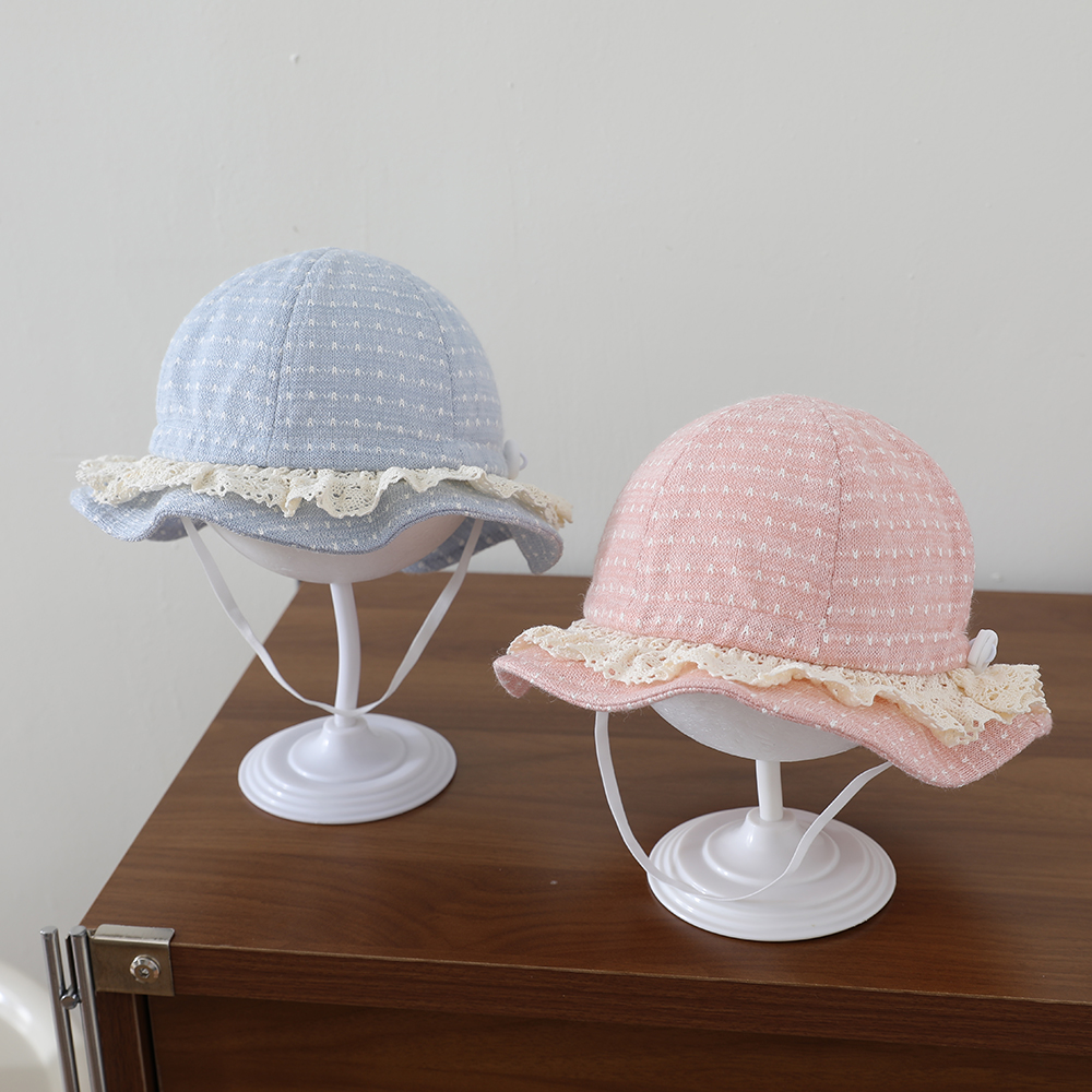 Cute Lace-edged Children's Hat Made Of Soft And Skin-friendly Jacquard Knitted Fabric, With Adjustable Fisherman-style Design. photo 1