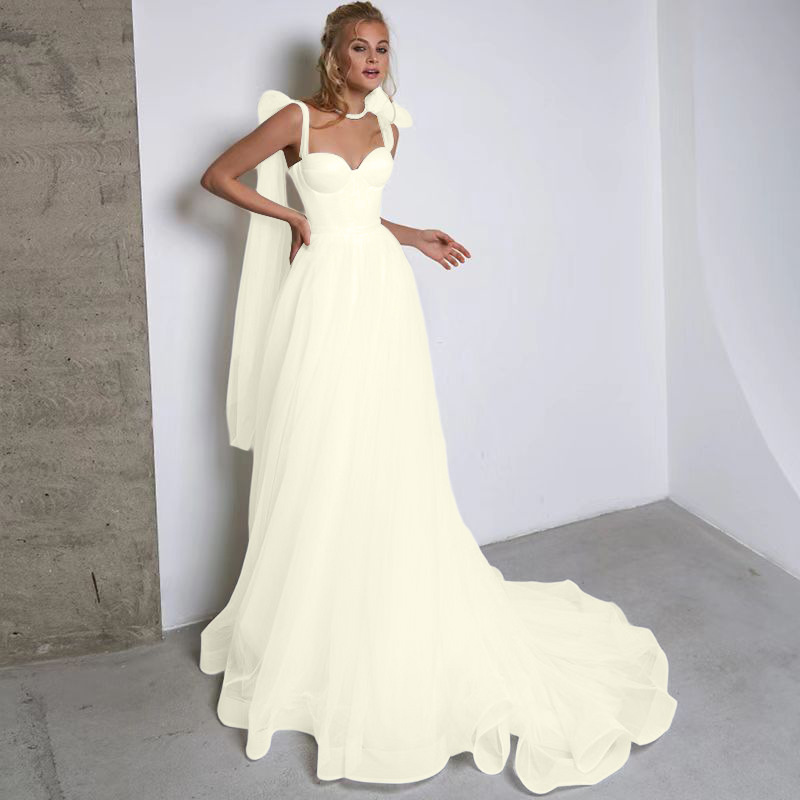 French-style Strapless Wedding Dress With A Bow Featuring A Tulle Train photo 2