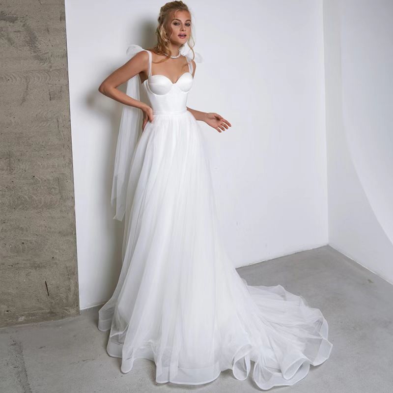 French-style Strapless Wedding Dress With A Bow Featuring A Tulle Train photo 3